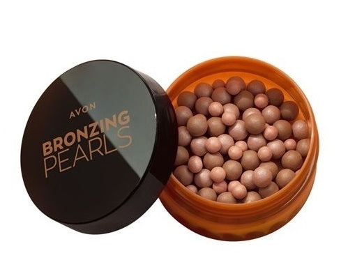 Perles poudre bronzante pour le visage AVON